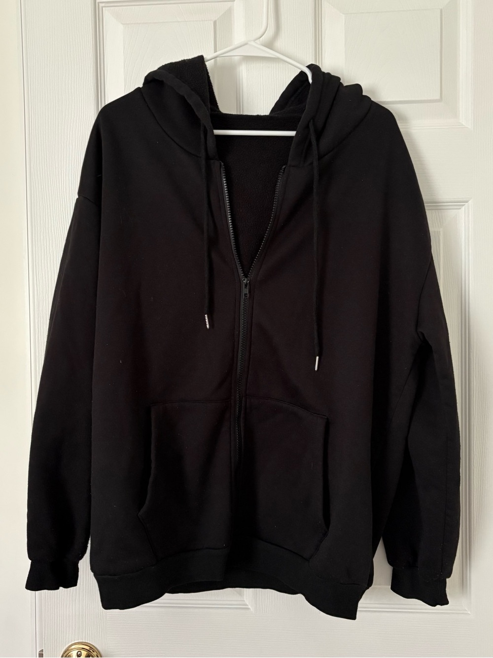 black zip up hoodie